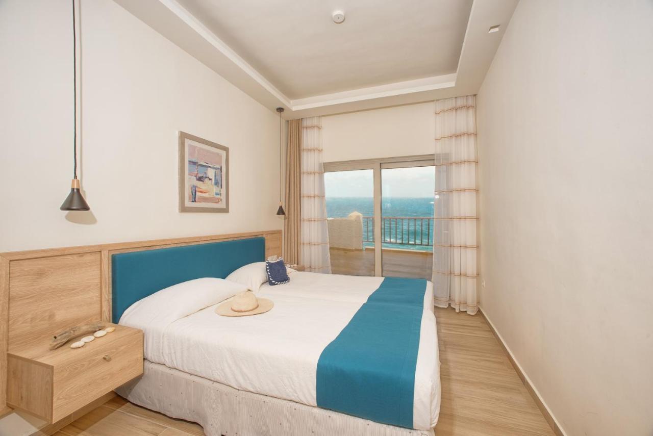 Cavos Bay Hotel & Studios أرمينيستيس المظهر الخارجي الصورة